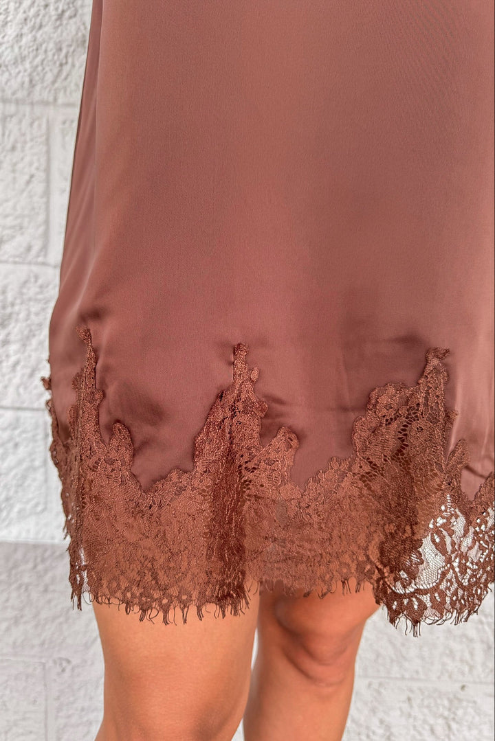 solid chocolate brown sleeveless satin shift dress with lace fringe bottom hemline