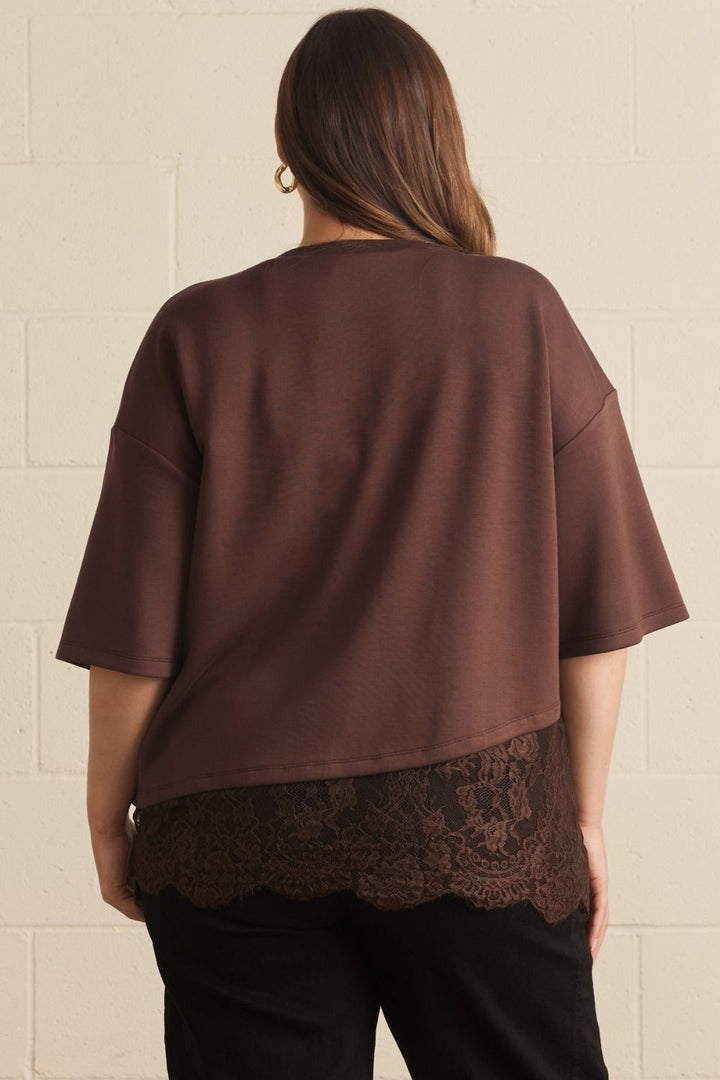 Entro plus size brown top with asymmetrical tiered lace detail at hem in a flattering fit