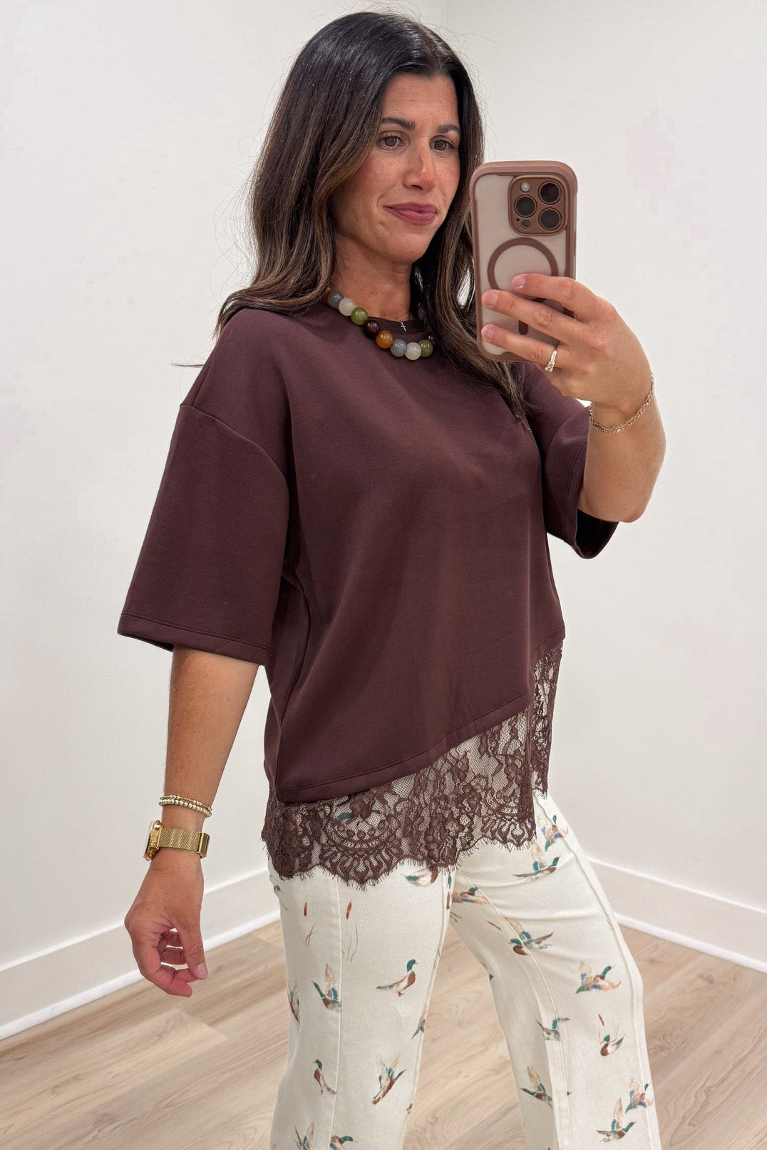 solid brown asymmetrical tiered lace hem drop shoulder short sleeve crew neckline top