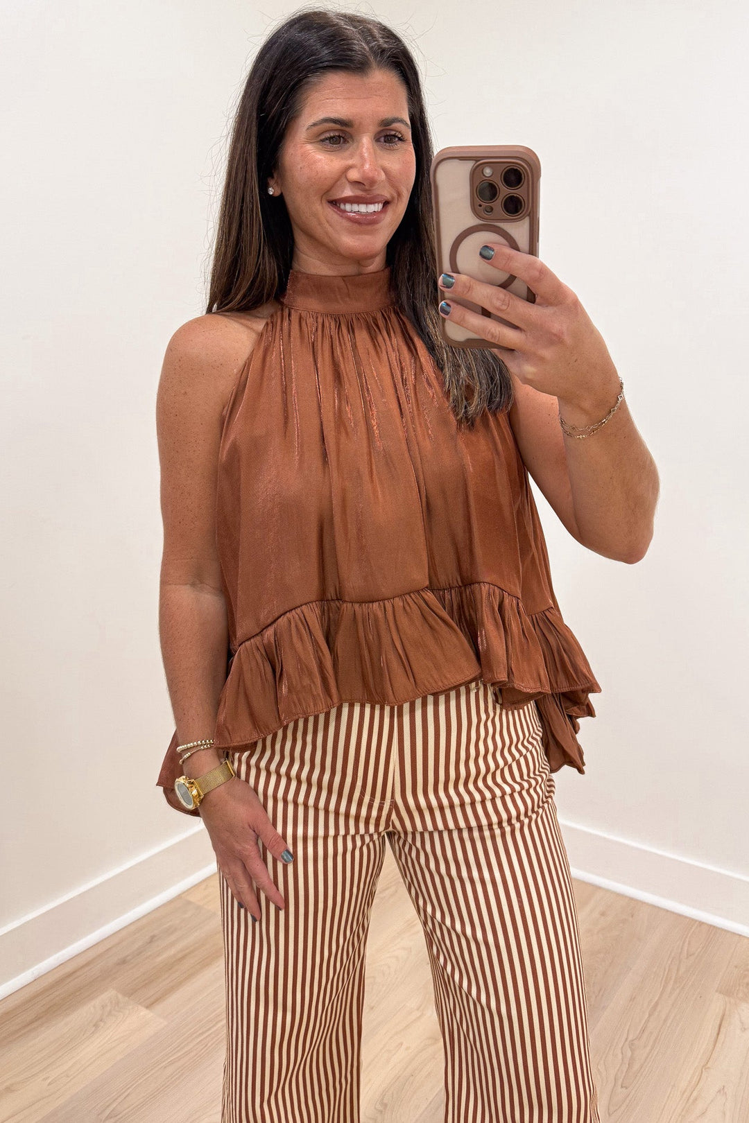 solid brown with metallic shimmer details sharkbite hem sleeveless satin halter top