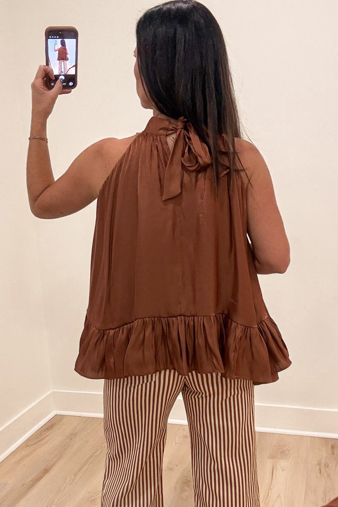 solid brown with metallic shimmer details sharkbite hem sleeveless satin tie-back halter top