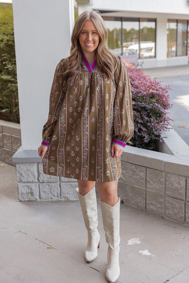 Women's brown olive babydoll dress with floral trellis print and hot pink trim by Jodifl showing full front view