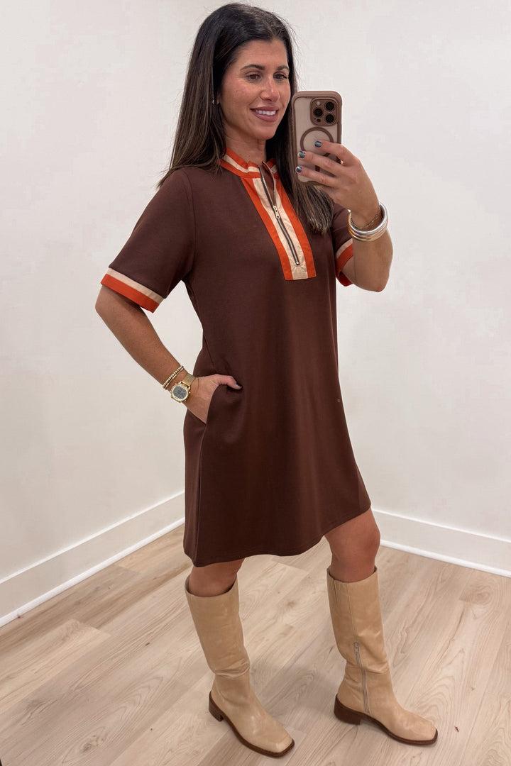 brown with orange and taupe striped trim details mock neck zip front bodice short dress with side pockets