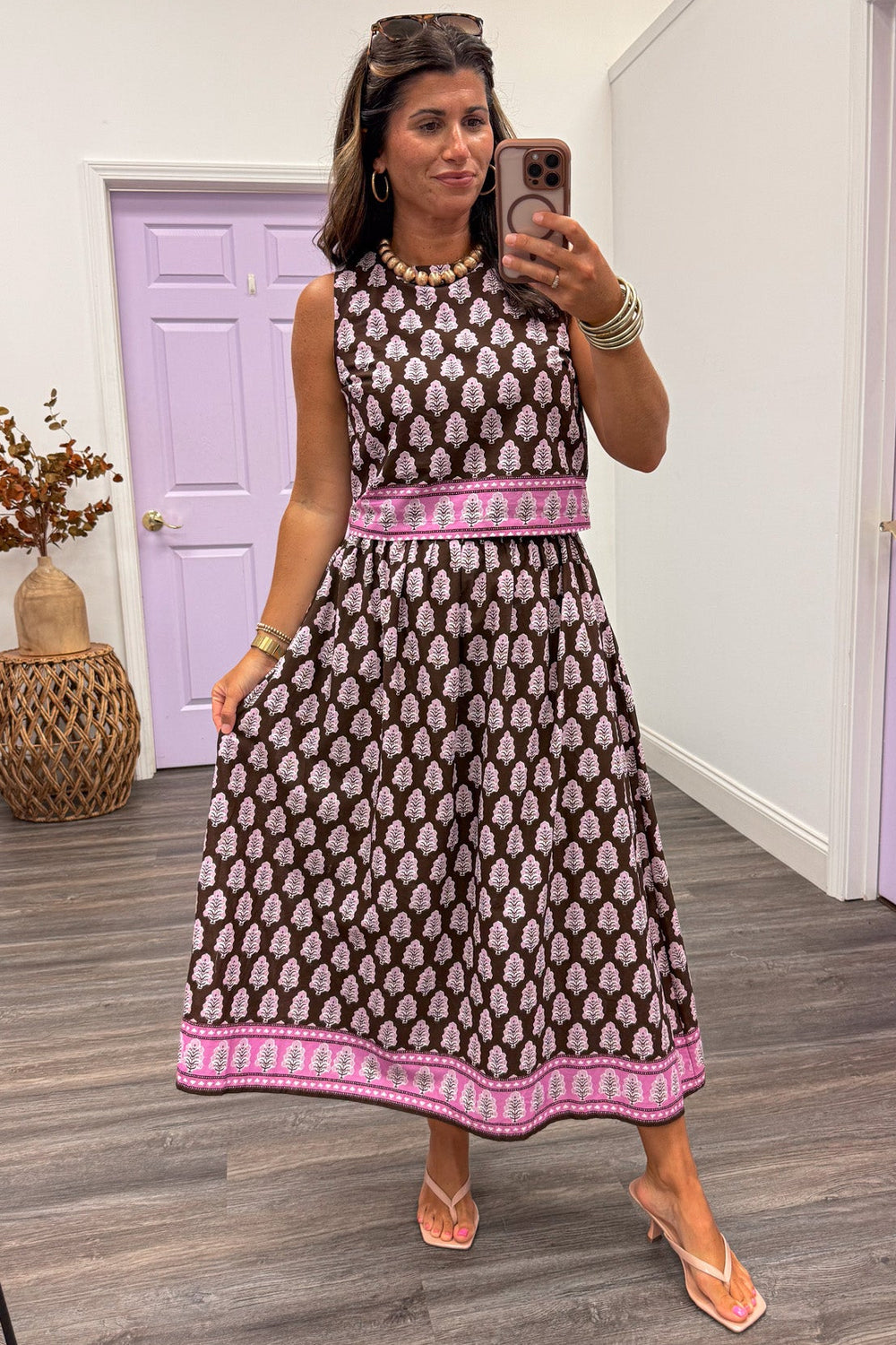brown and pink floral print with pink border trim elastic waist flowy silhouette midi skirt