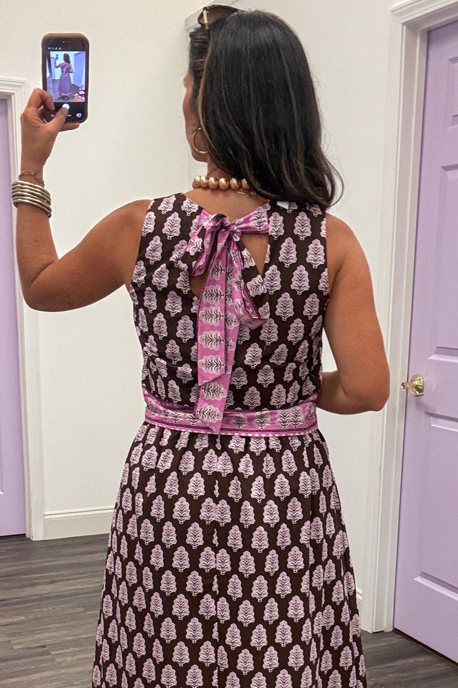 brown and pink floral print with pink border trim sleeveless cotton top with bow tie back