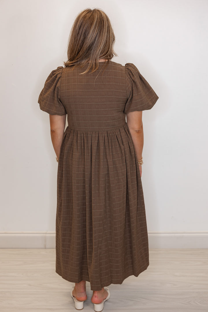 Women's brown check-textured monochrome midi dress with cream bows by In February showing full back view
