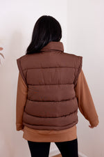 brown puffer vests