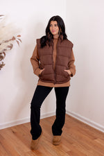 brown puffer vests