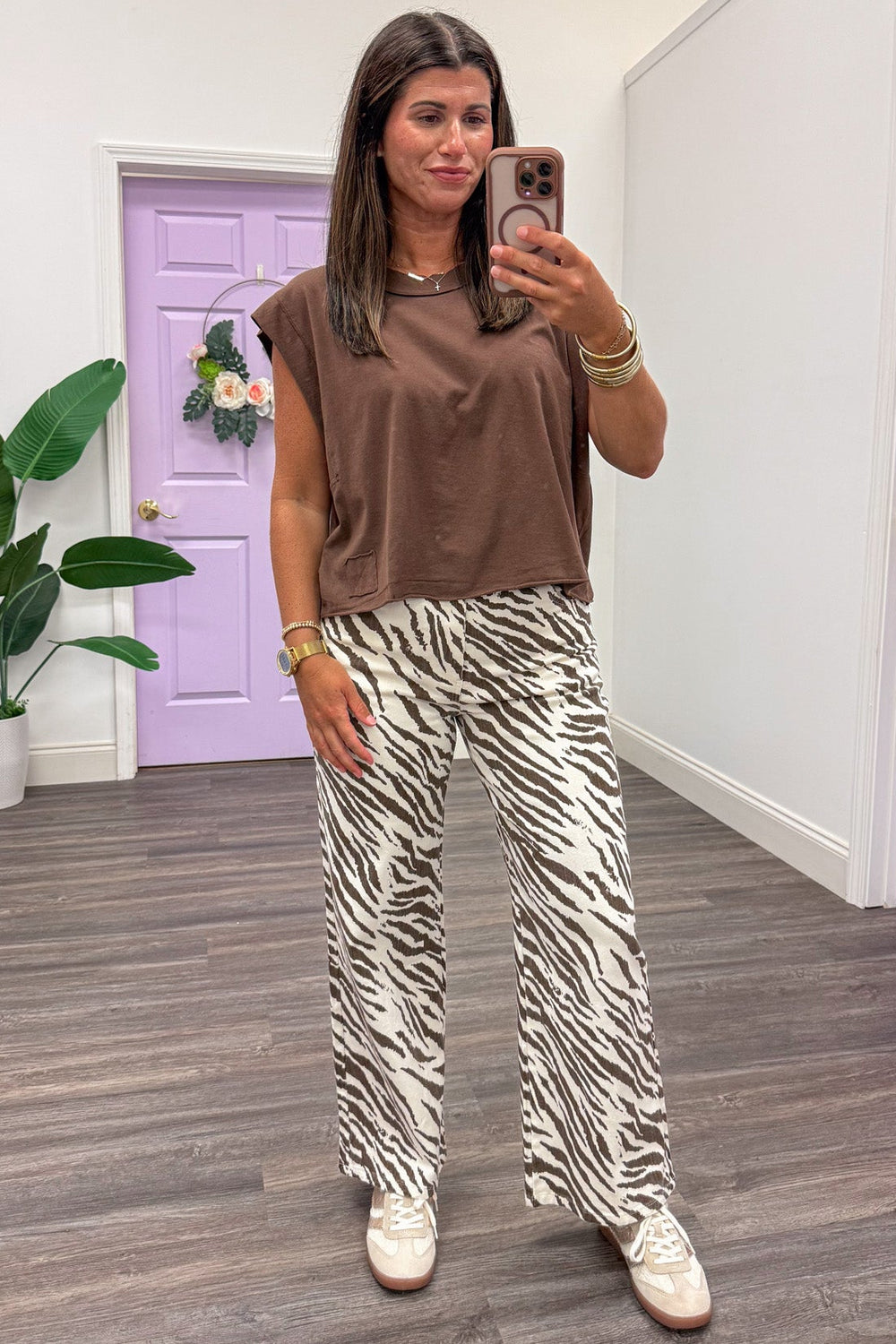 solid brown crew neckline sleeveless semi-cropped jersey knit cotton top with reverse seam details