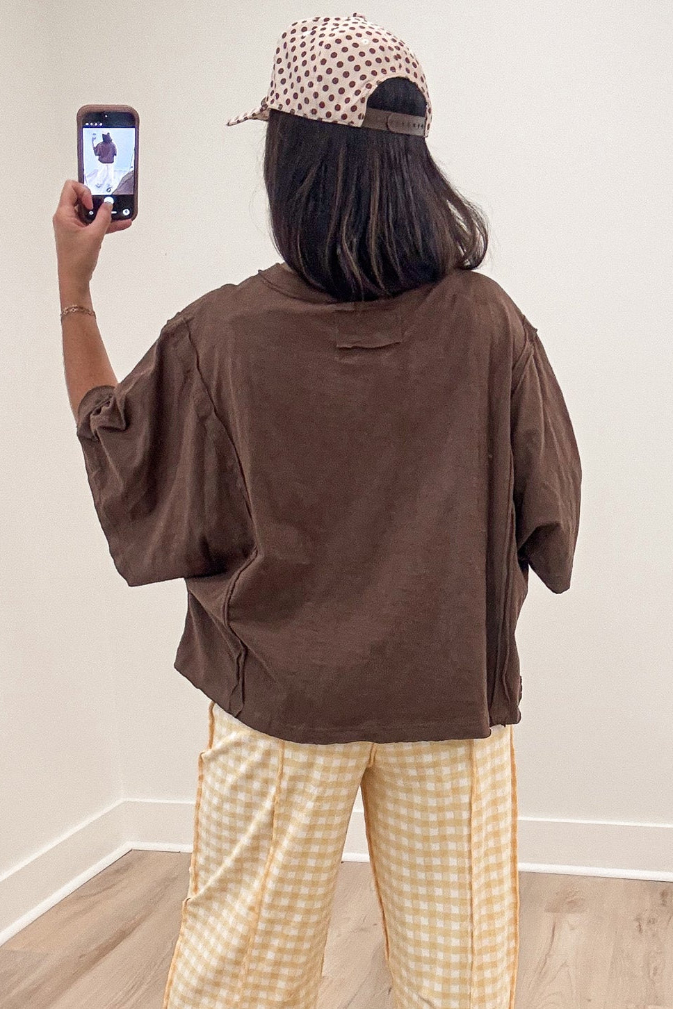 solid espresso brown short sleeve crew neckline oversized cotton t-shirt with reverse seam details