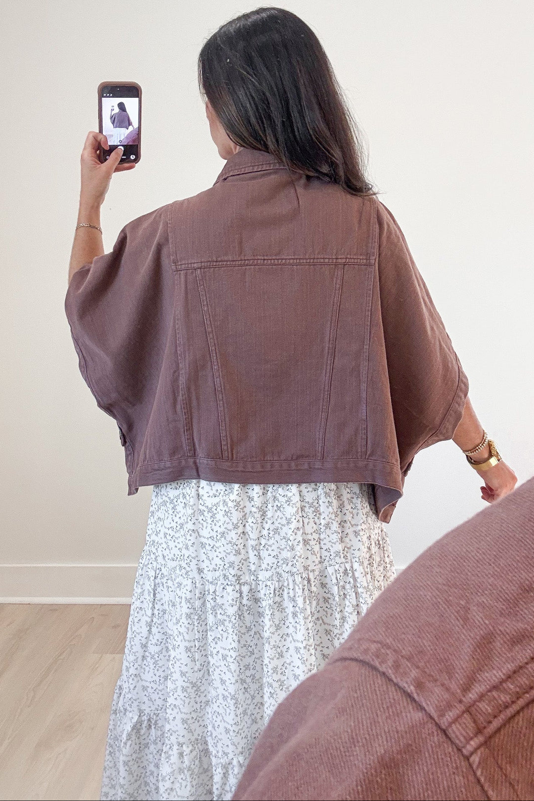 solid brown short sleeve poncho style  collared neckline button front semi-cropped denim jacket