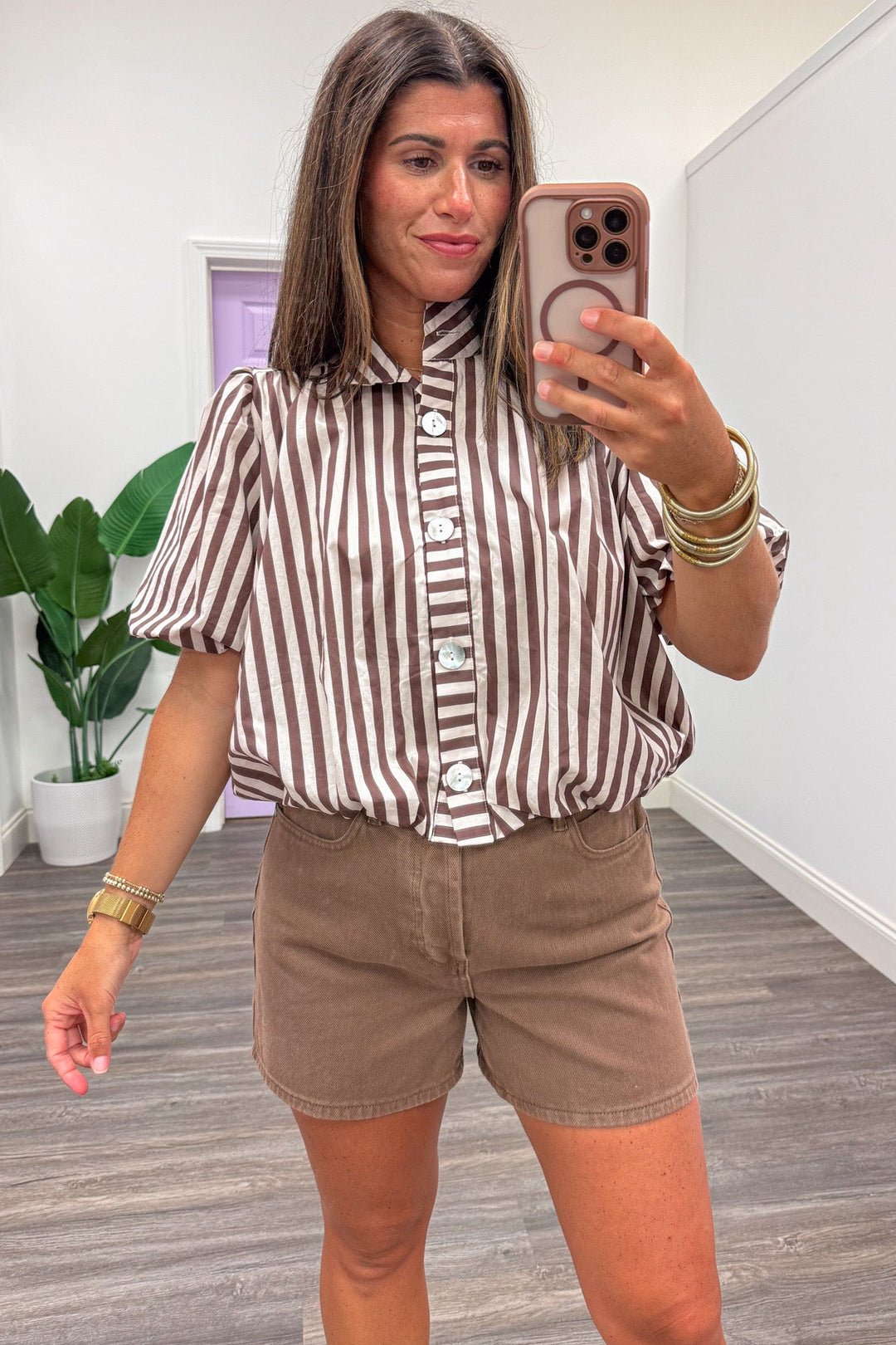 brown and ecru striped short sleeve bubble hem button front semi-cropped top