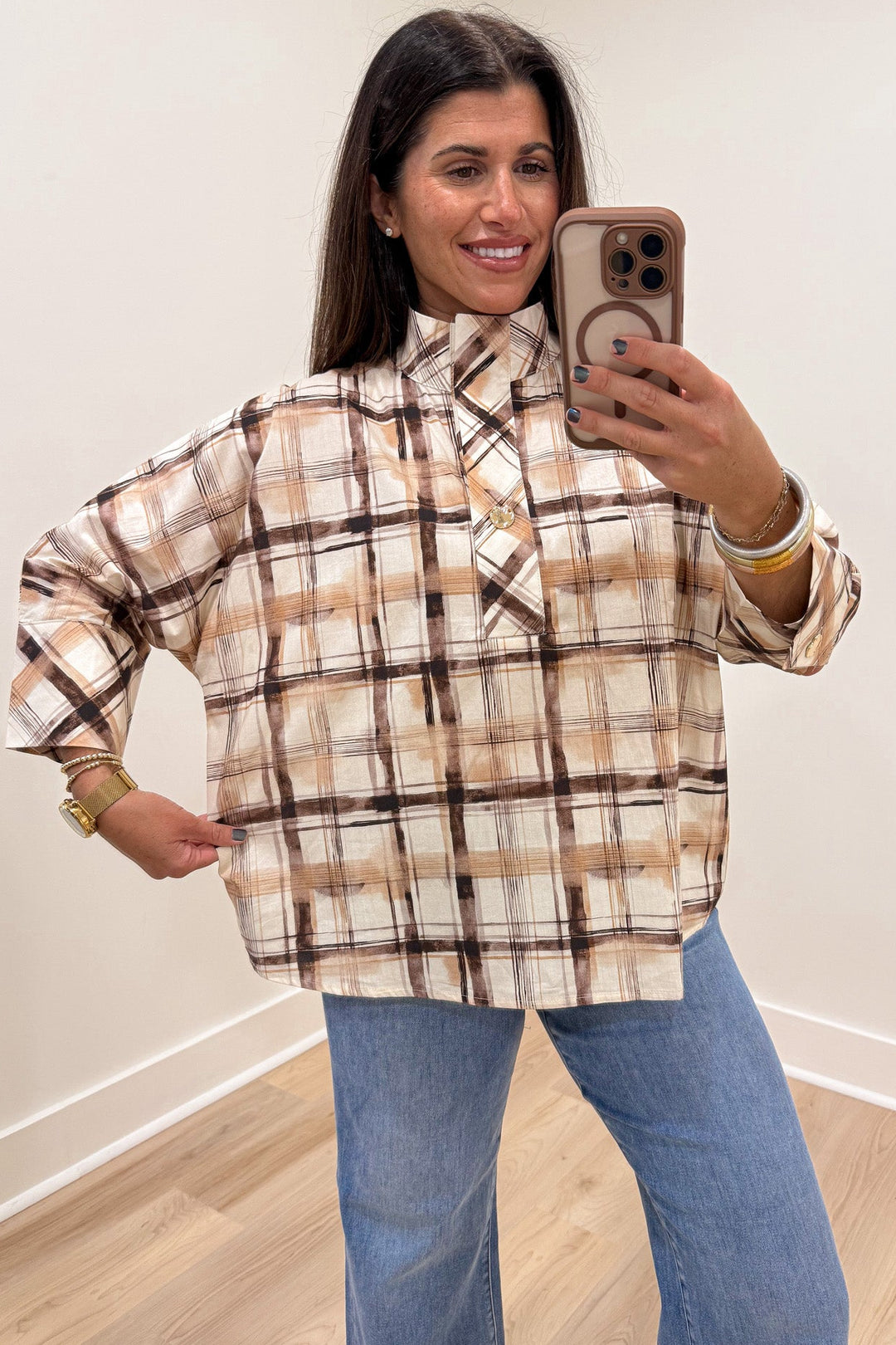 brown tan and cream plaid print half sleeve high neckline rounded bottom hem relaxed silhouette top