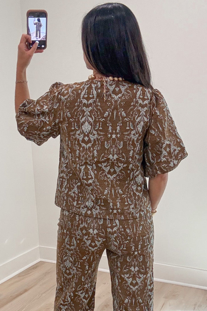 textured brown with silvery blue jacquard paisley print cuffed short sleeve button front top