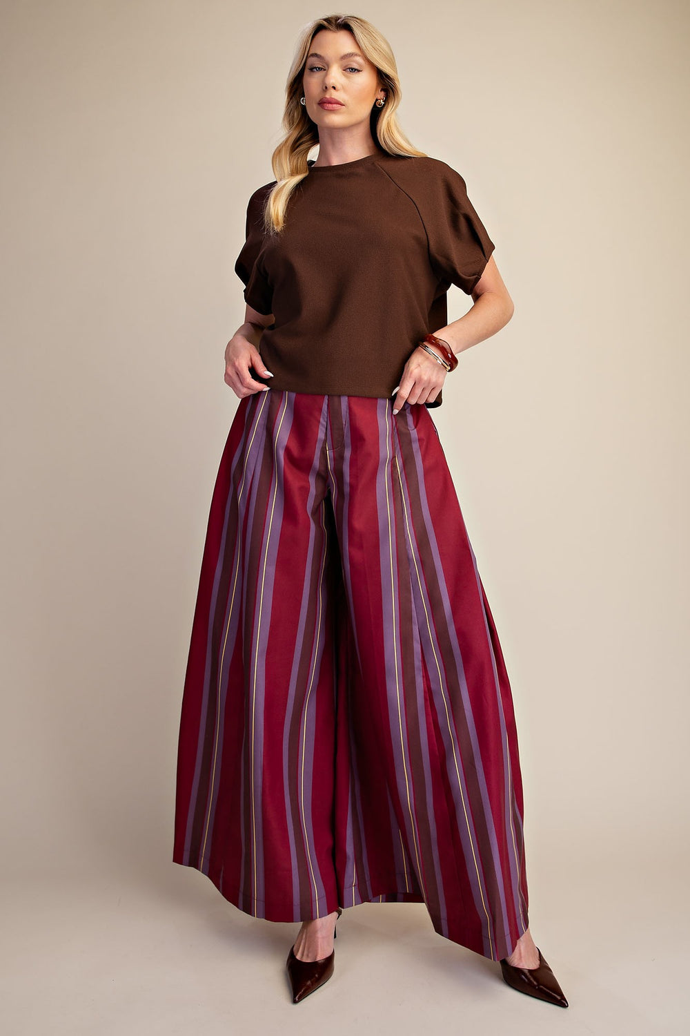 Brown textured knit top with gathered puff sleeves by glam