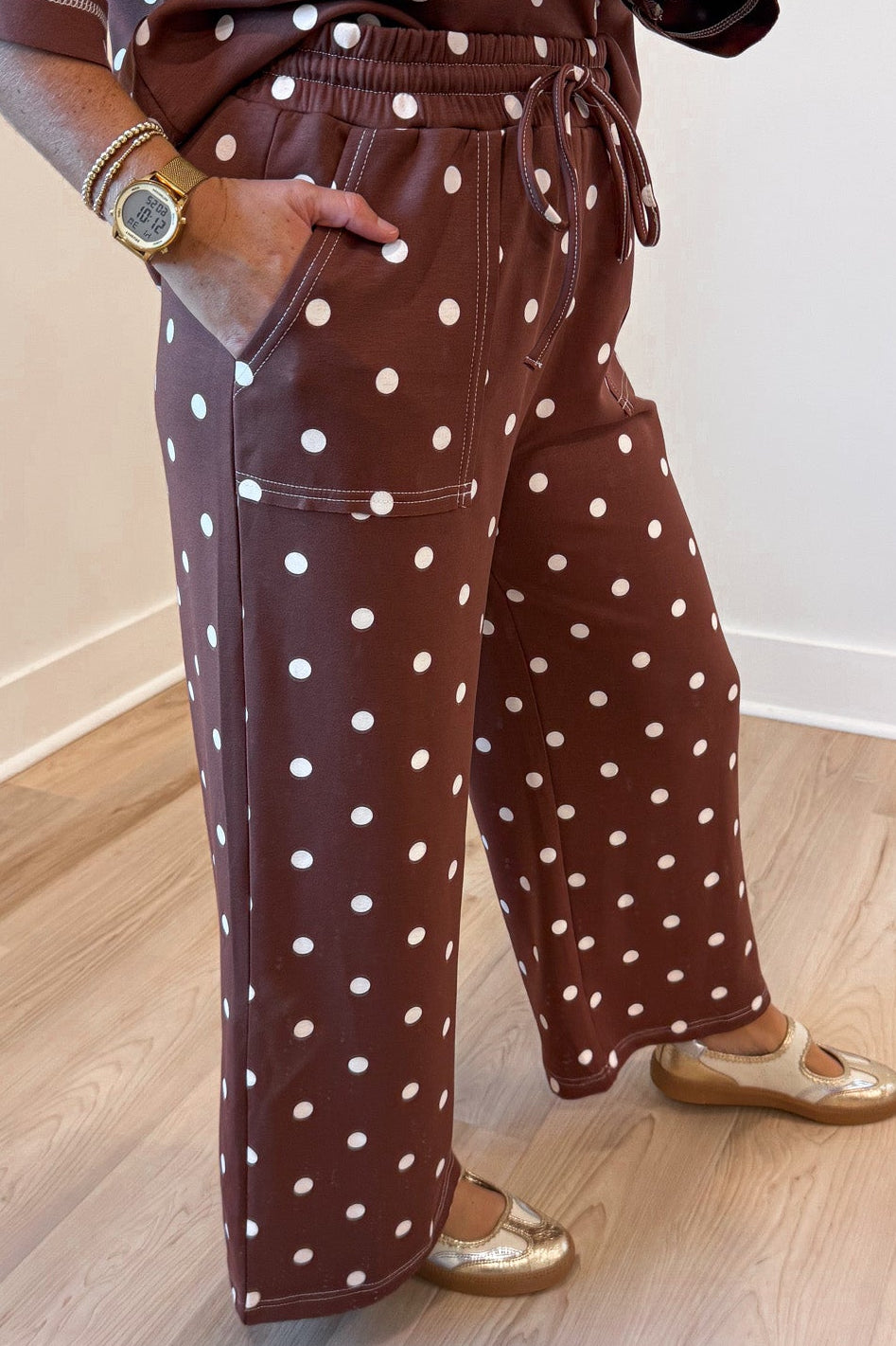 chocolate brown with white polka dot print top and front pocket pants matching knit set