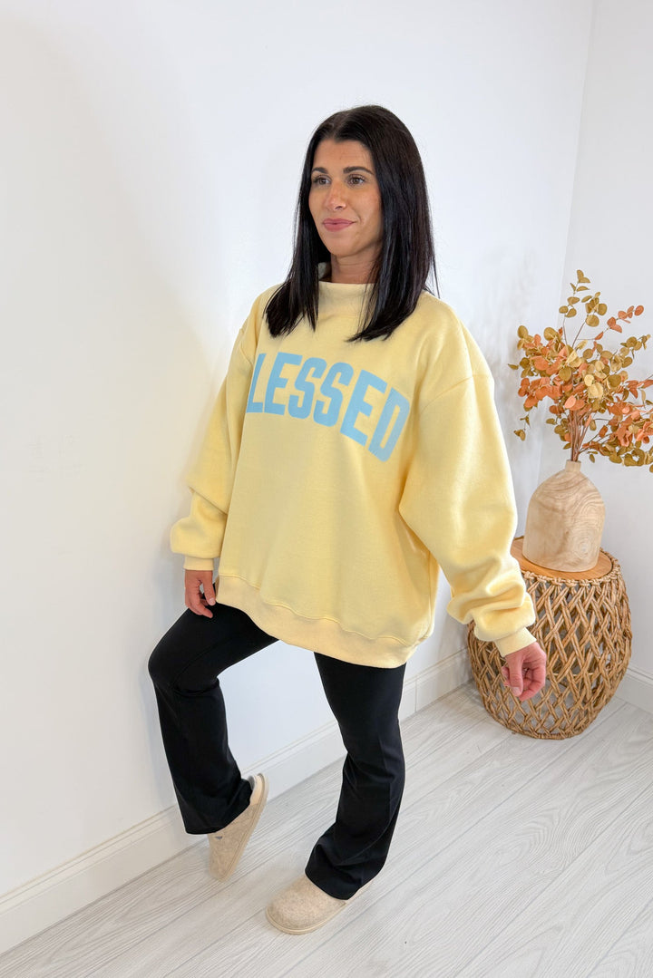 mock neck oversized god is good butter yellow sweatshirt side