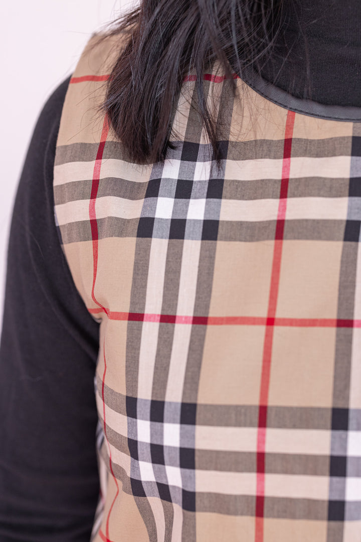 Women's taupe, black and red plaid sleeveless dress with faux leather trim by Jodifl showing up close look at plaid pattern