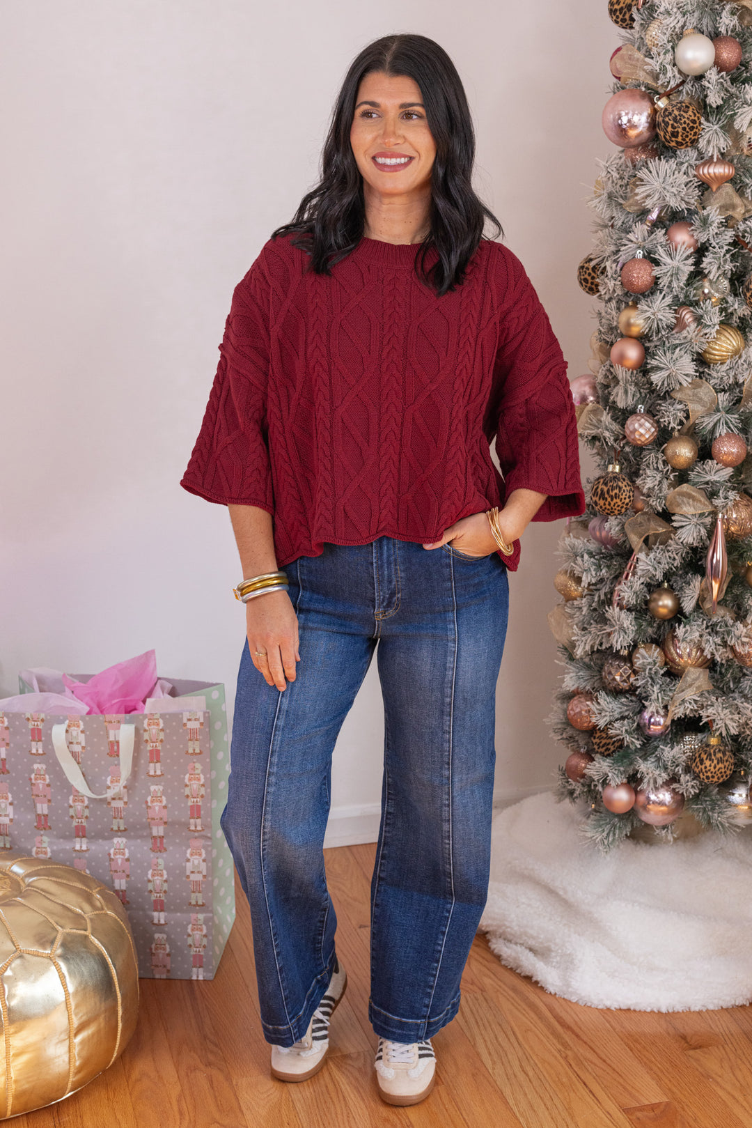 Women's burgundy cable knit cropped sweater by Entro showing full front view