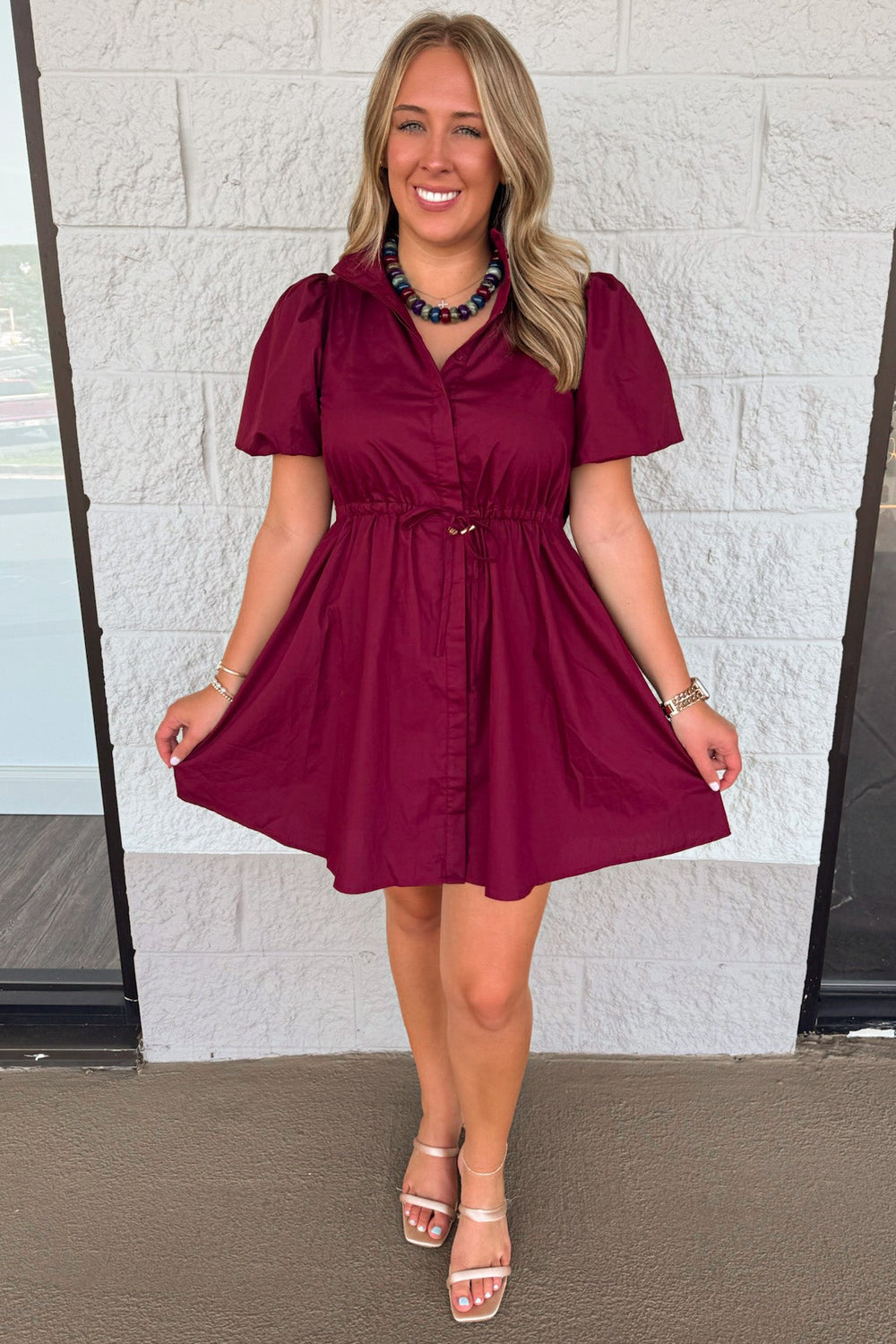 solid burgundy button front puff sleeve cinch waist flowy cotton poplin short dress