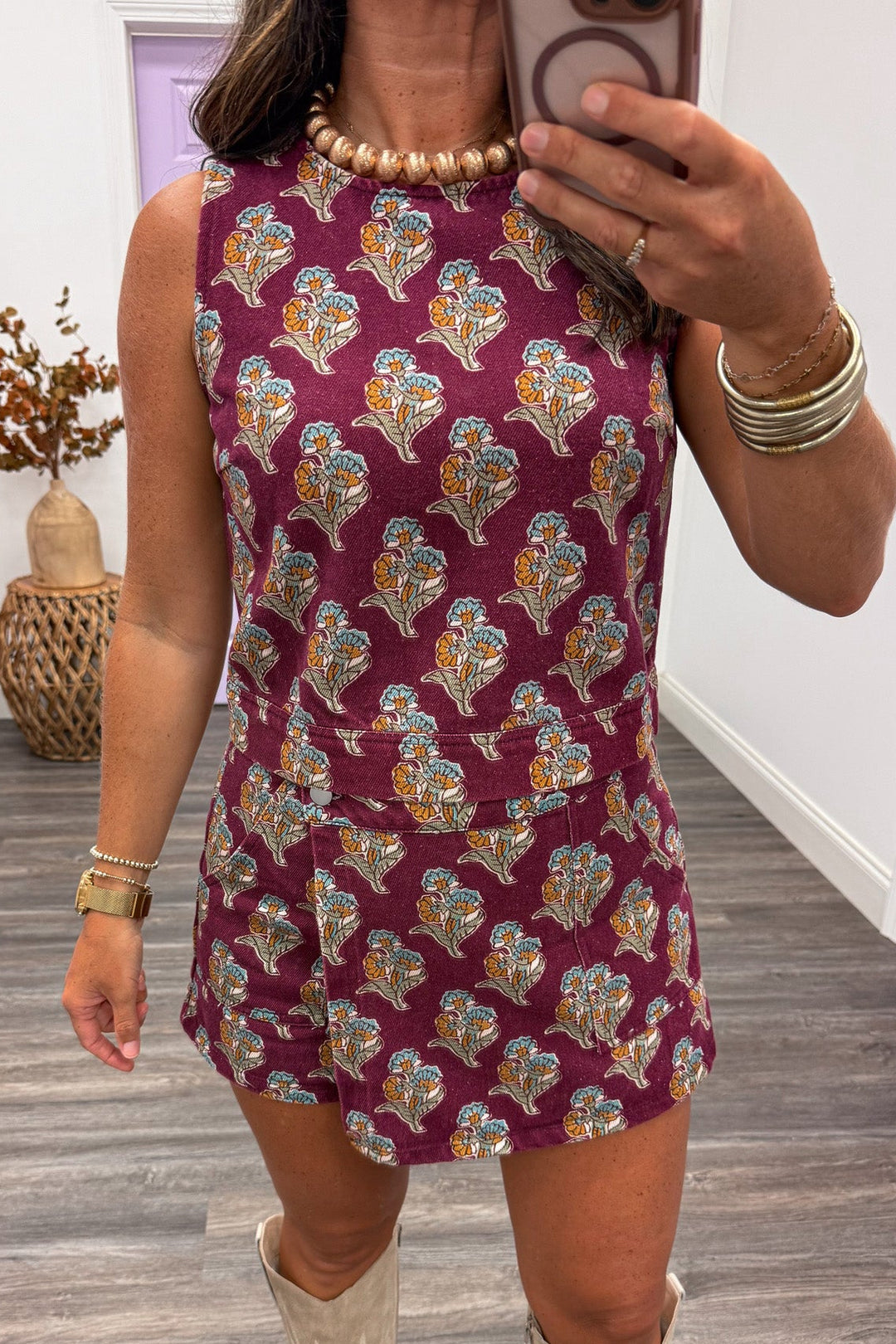 burgundy with orange teal and olive floral print sleeveless crew neckline denim top