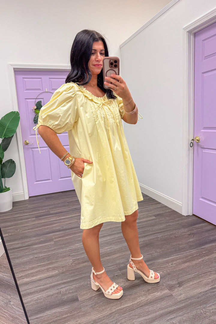 butter pale yellow babydoll pintuck dress side