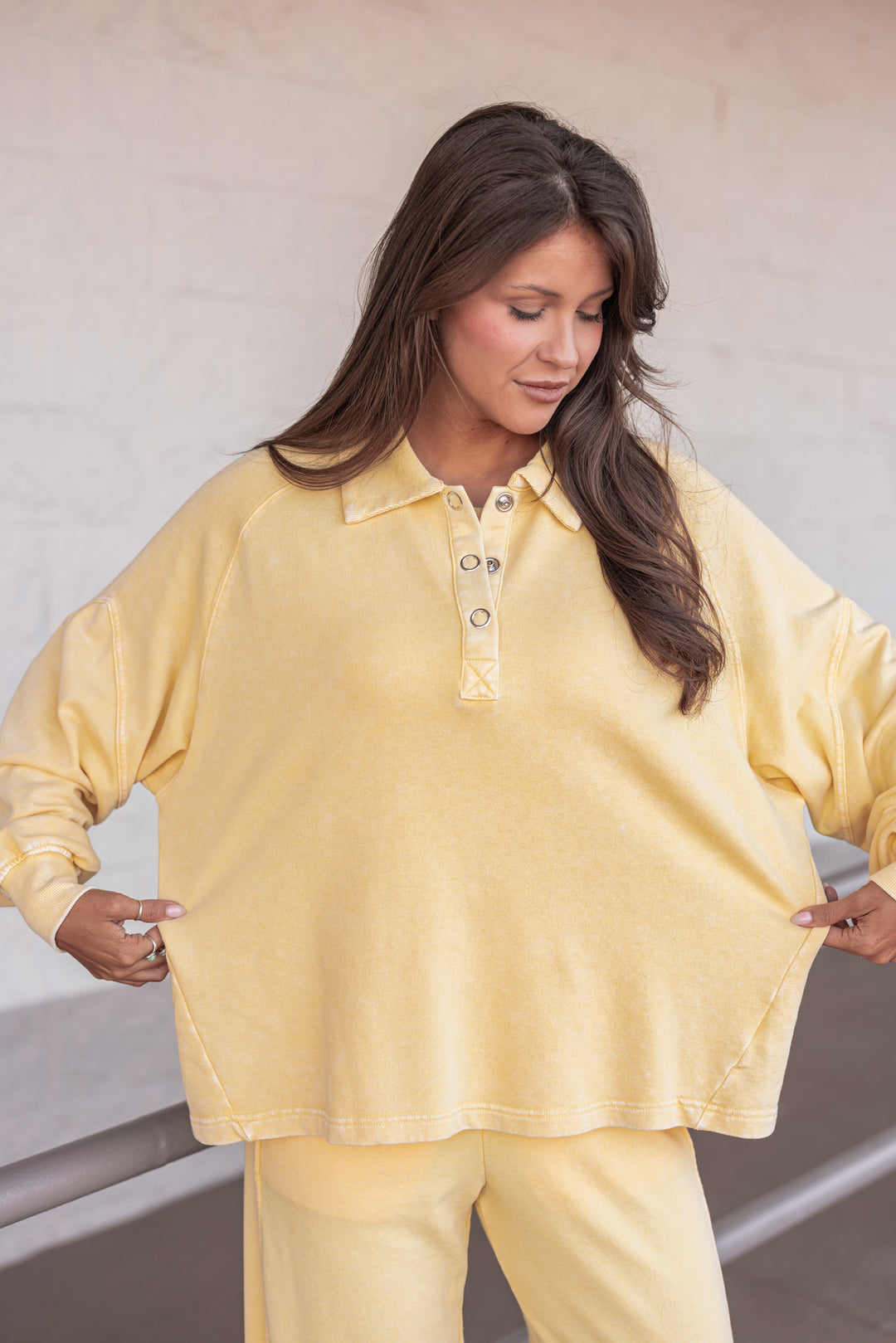 butter yellow button neckline pullover top fit pic