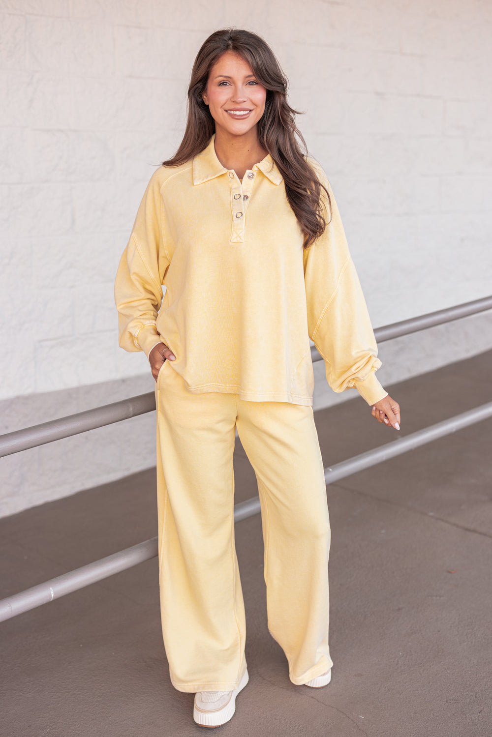 butter yellow button neckline pullover top outfit