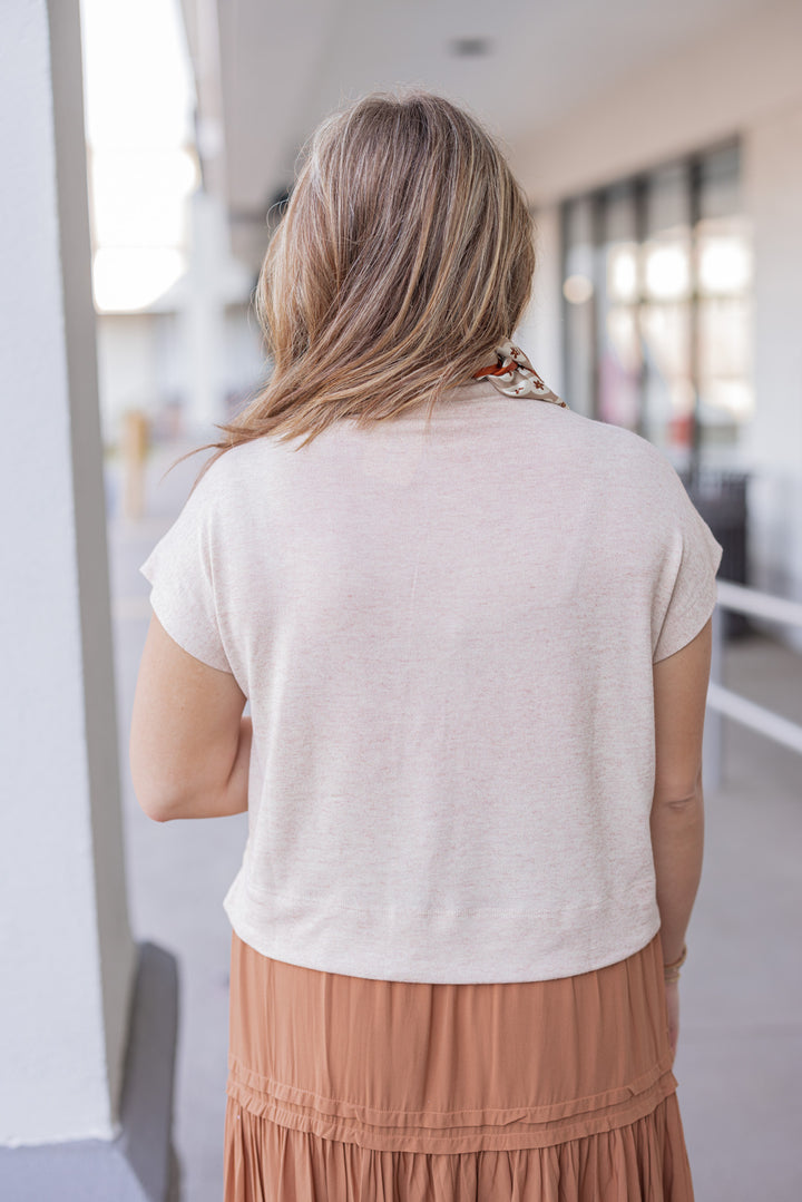 Women's oatmeal knit cropped top by Entro showing up close back view