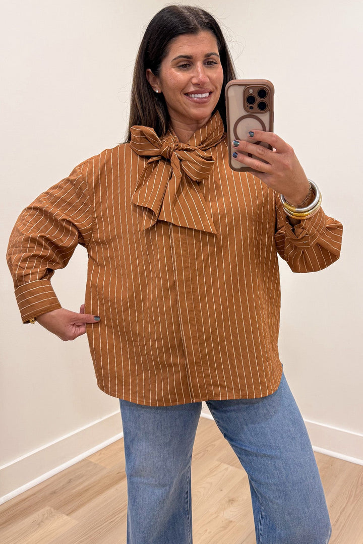 caramel and taupe striped mock neck long sleeve flap covered button front relaxed silhouette top