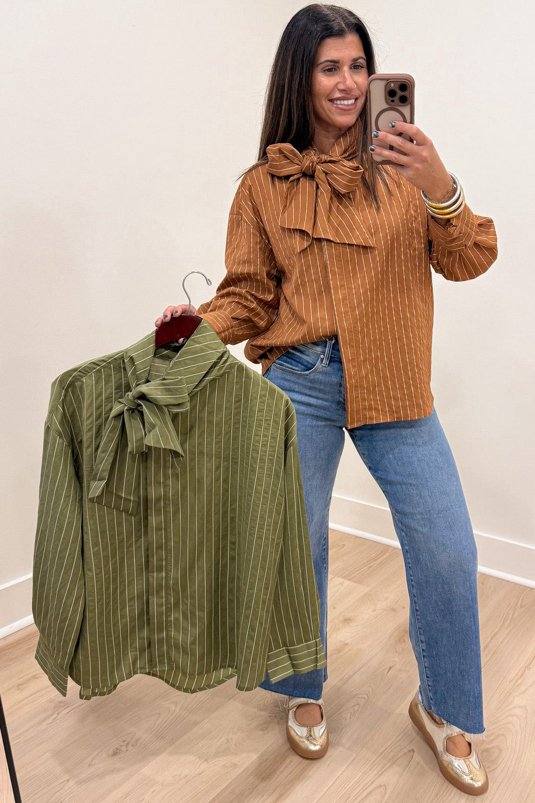 caramel and taupe striped mock neck button cuffed long sleeve flap covered button front top
