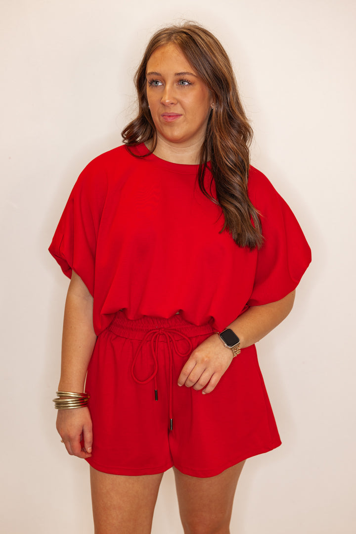 red scuba knit bubble hem casual top