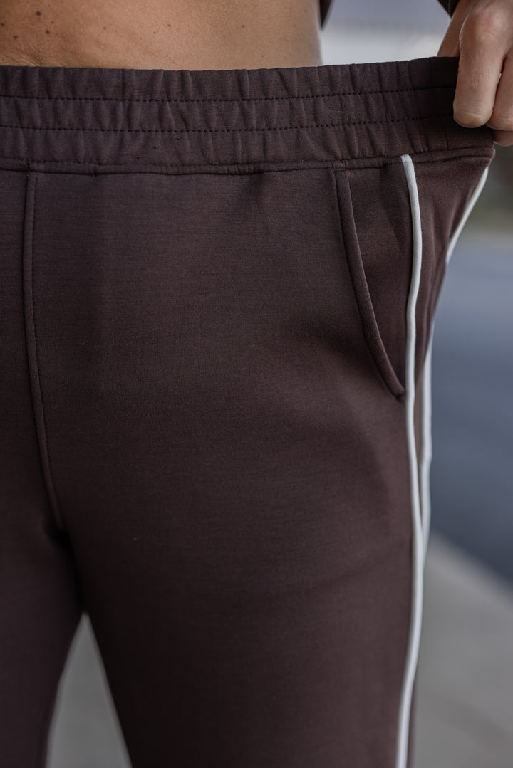 Women's chocolate brown scuba knit straight leg elastic waist pants by Rae Mode showing elastic waistband