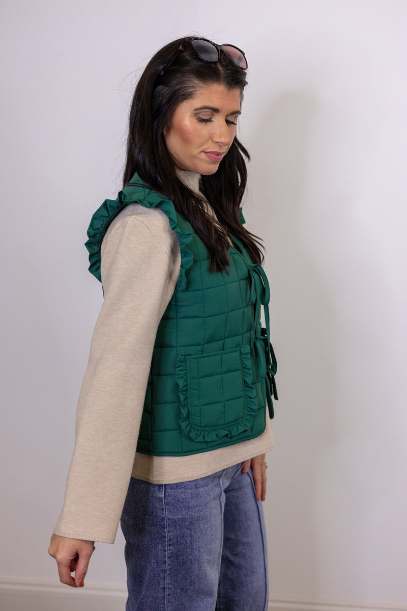 emerald green quilted bow vest