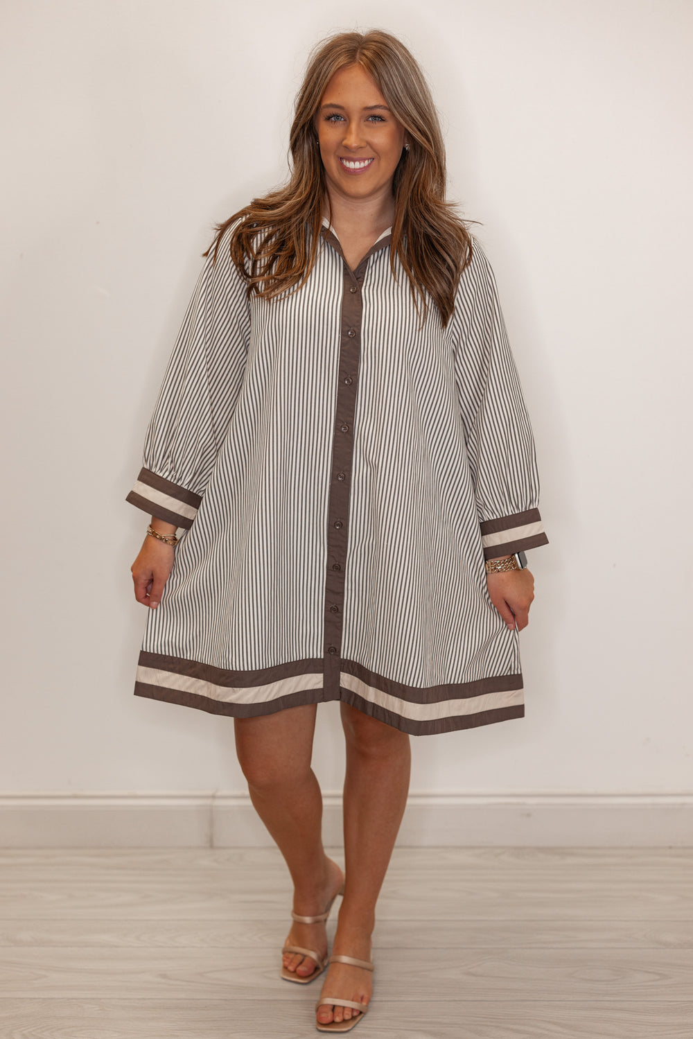 Women's striped ivory and mocha dress, shown without belt