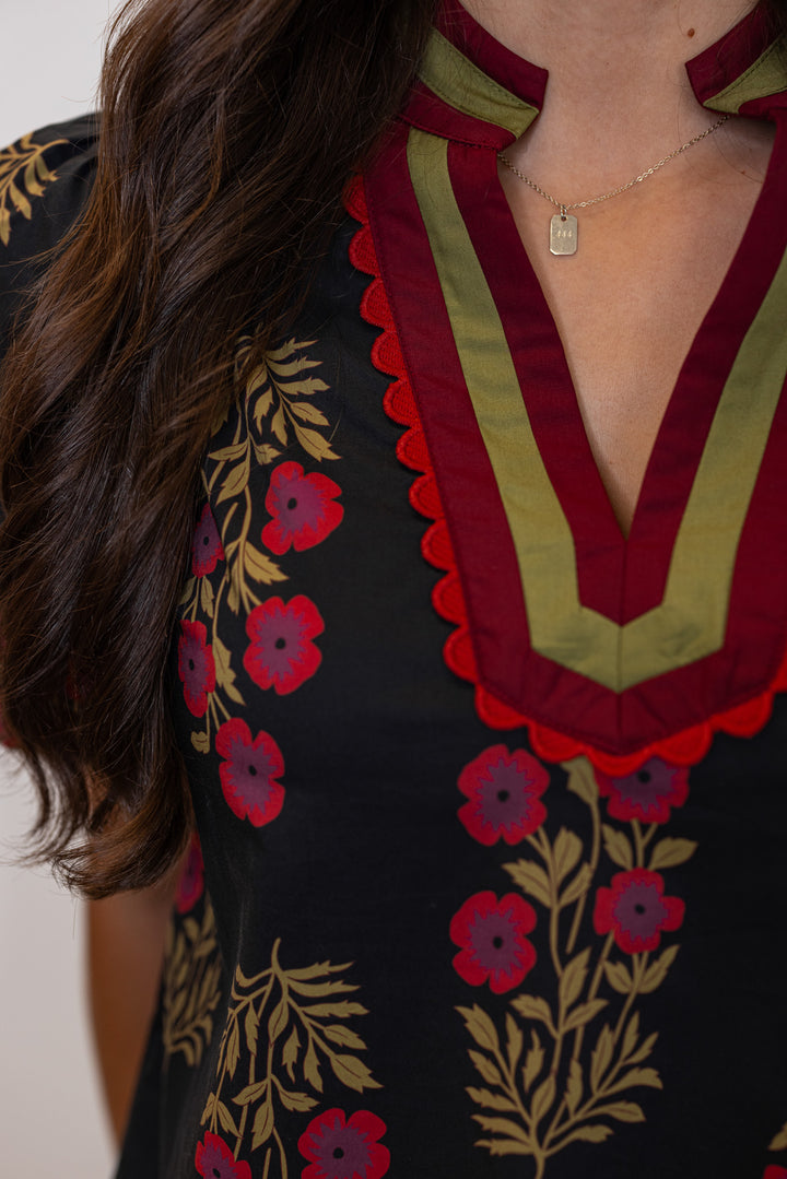 Women's black and burgundy floral poplin top by Entro showing caftan inspired banded v neckline