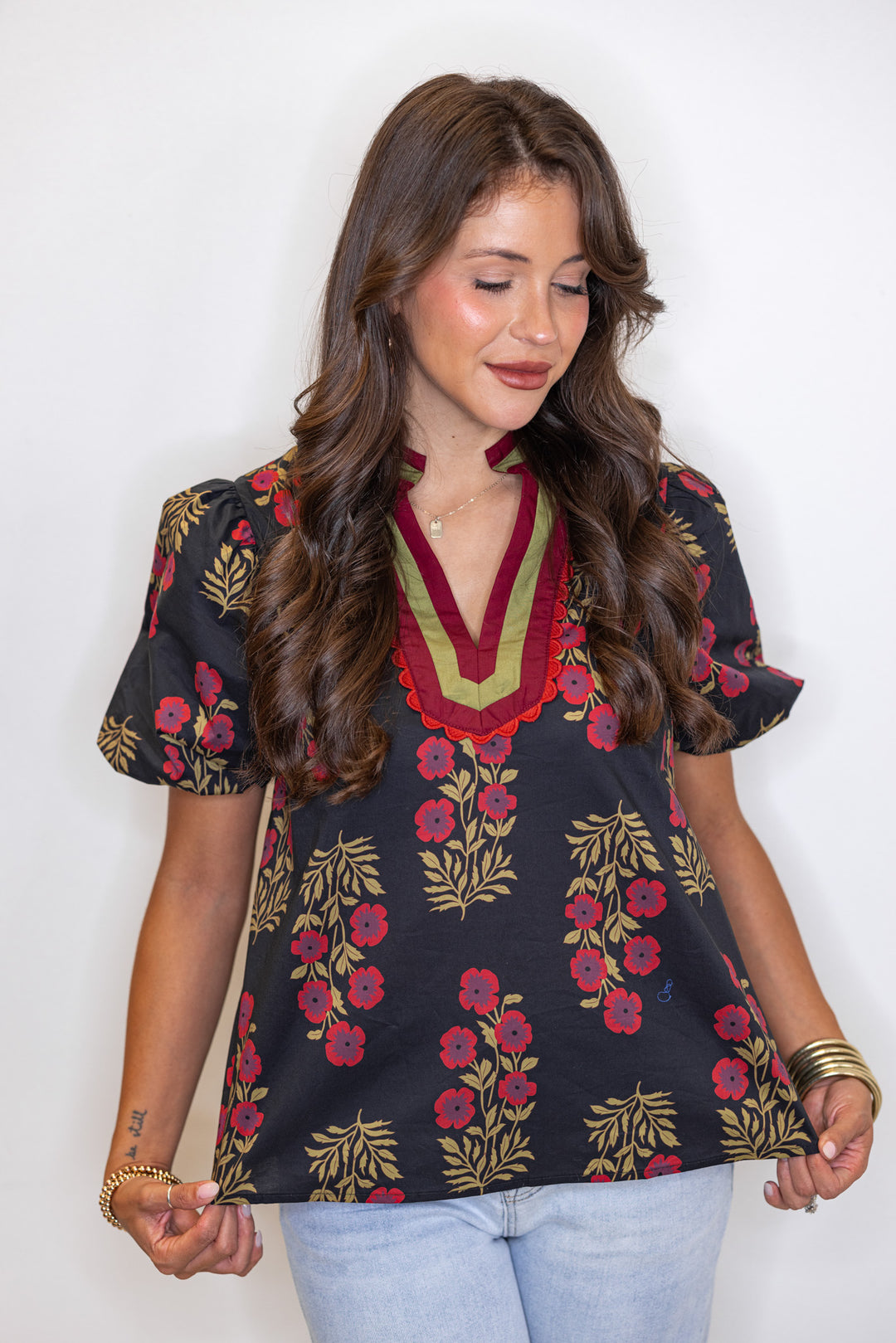 Women's black and burgundy floral poplin top with caftan inspired banded v neckline by Entro