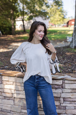 cream black trim bow sleeve top