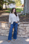 cream black trim bow sleeve top