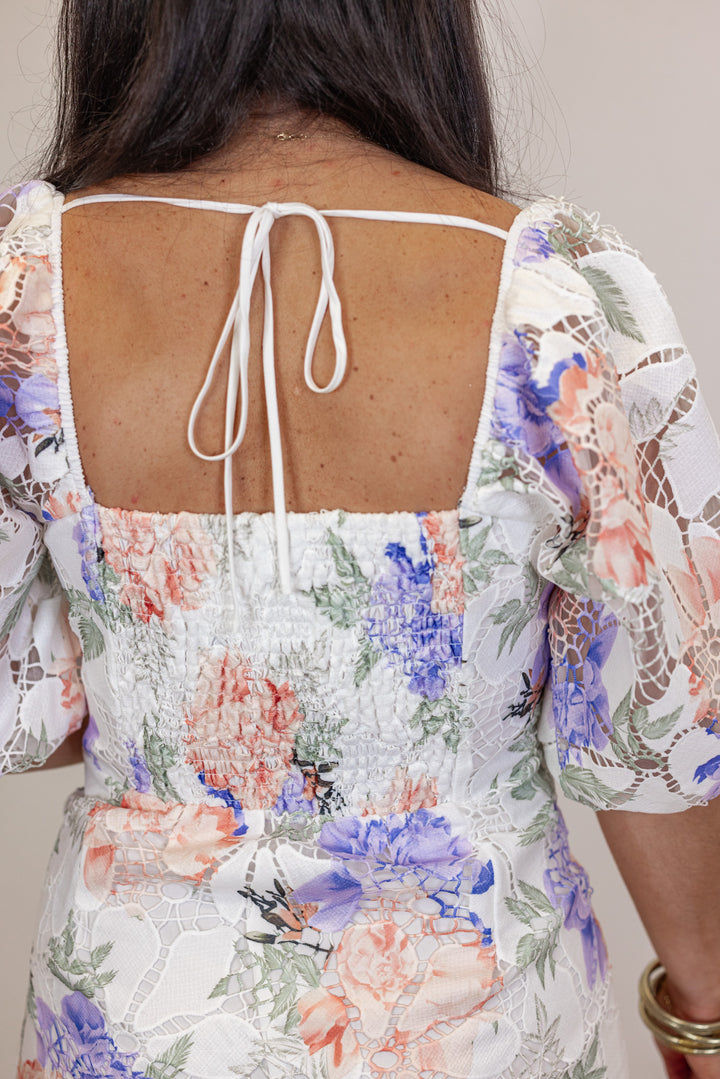 white eyelet embroidered floral mini dress