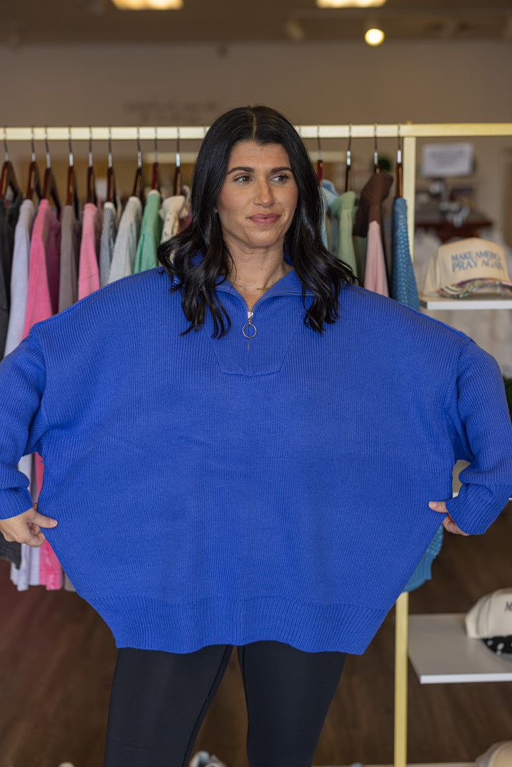 Cobalt blue ribbed knit half zip sweater by She + Sky showing relaxed fit