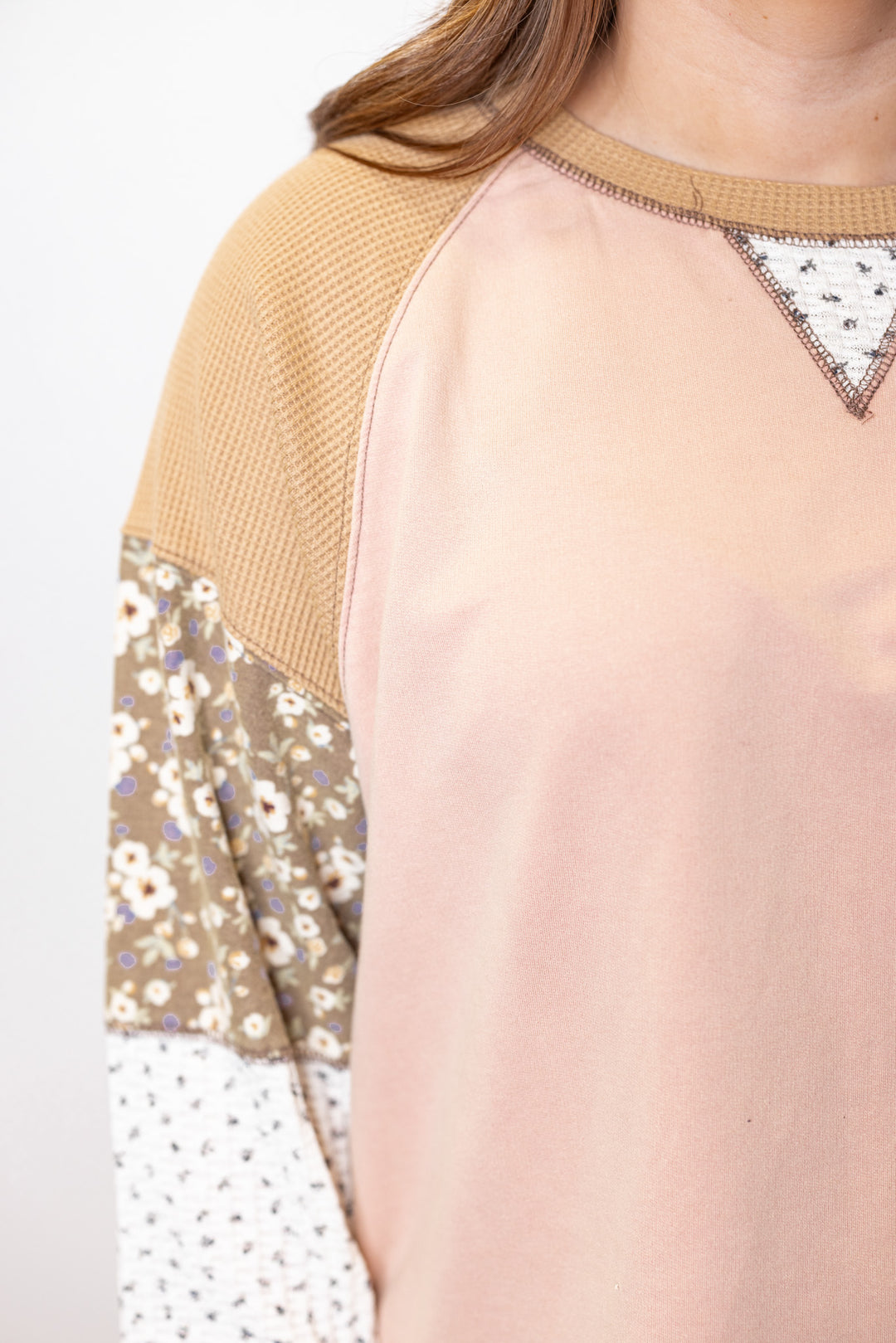 Women's washed rose pink terry knit and tan waffle knit top by Easel showing up close view of colorblock floral patch details