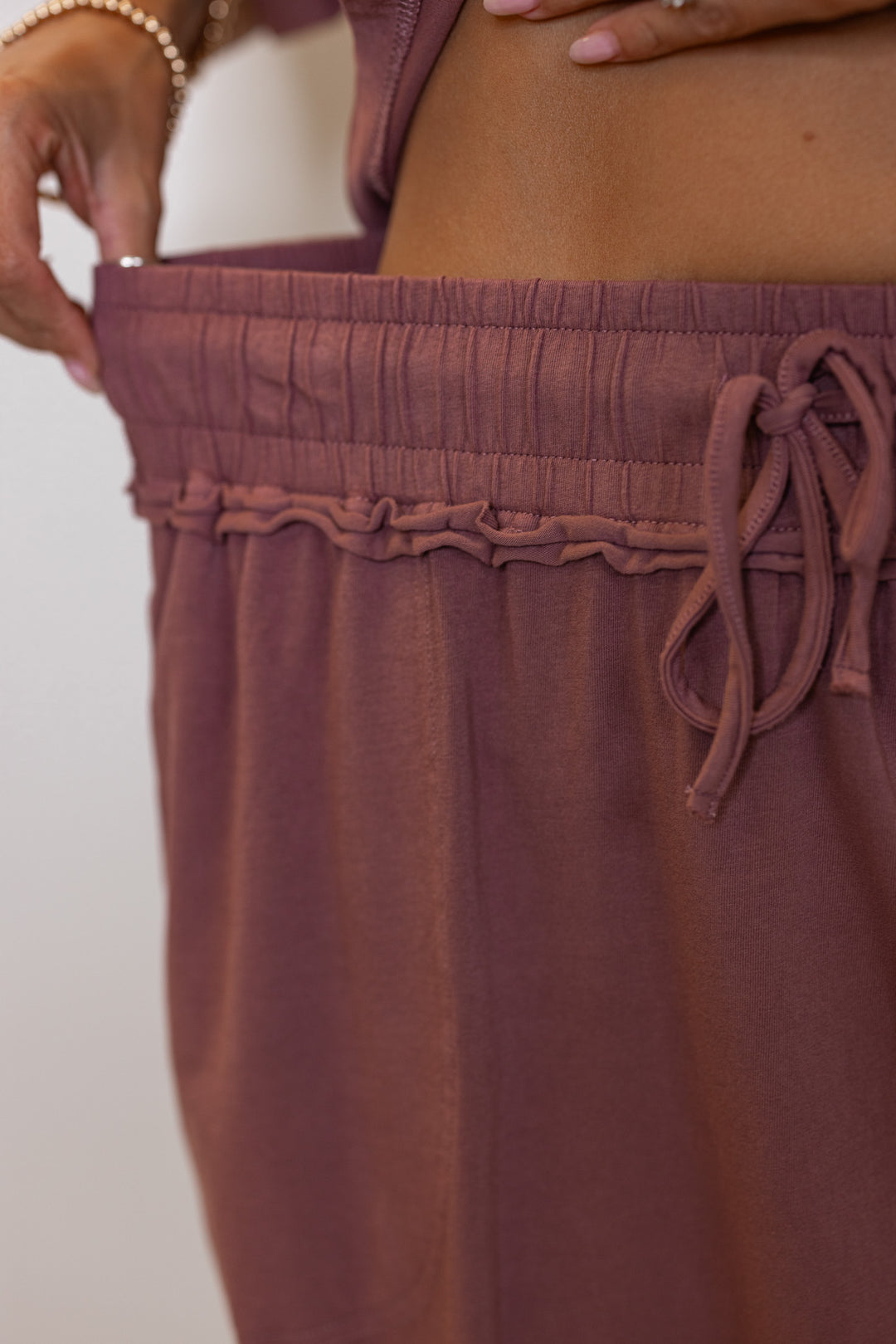 Close up showing elastic waistband of skirt