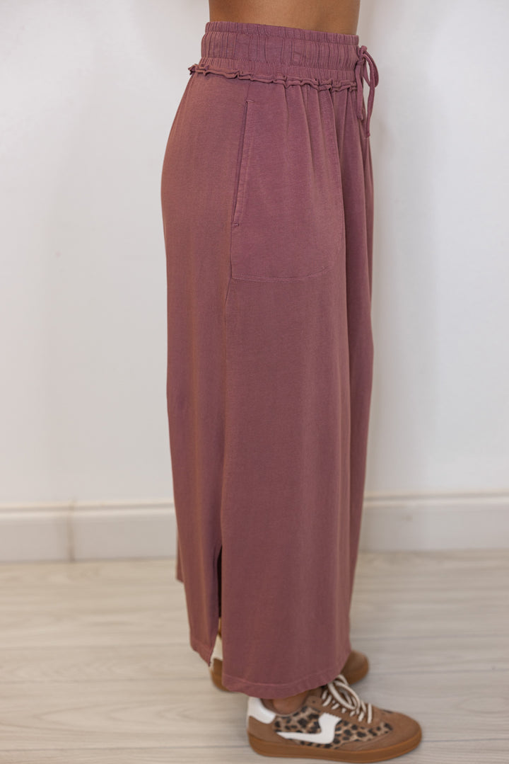 Side view of dusty rose knit maxi skirt