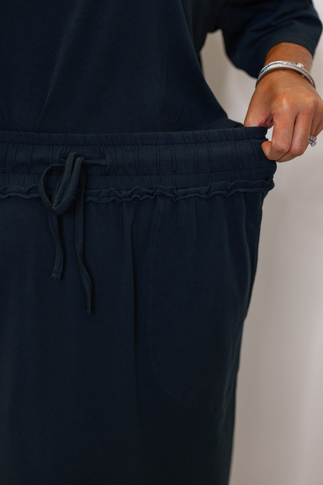 Navy blue skirt with a drawstring waistband