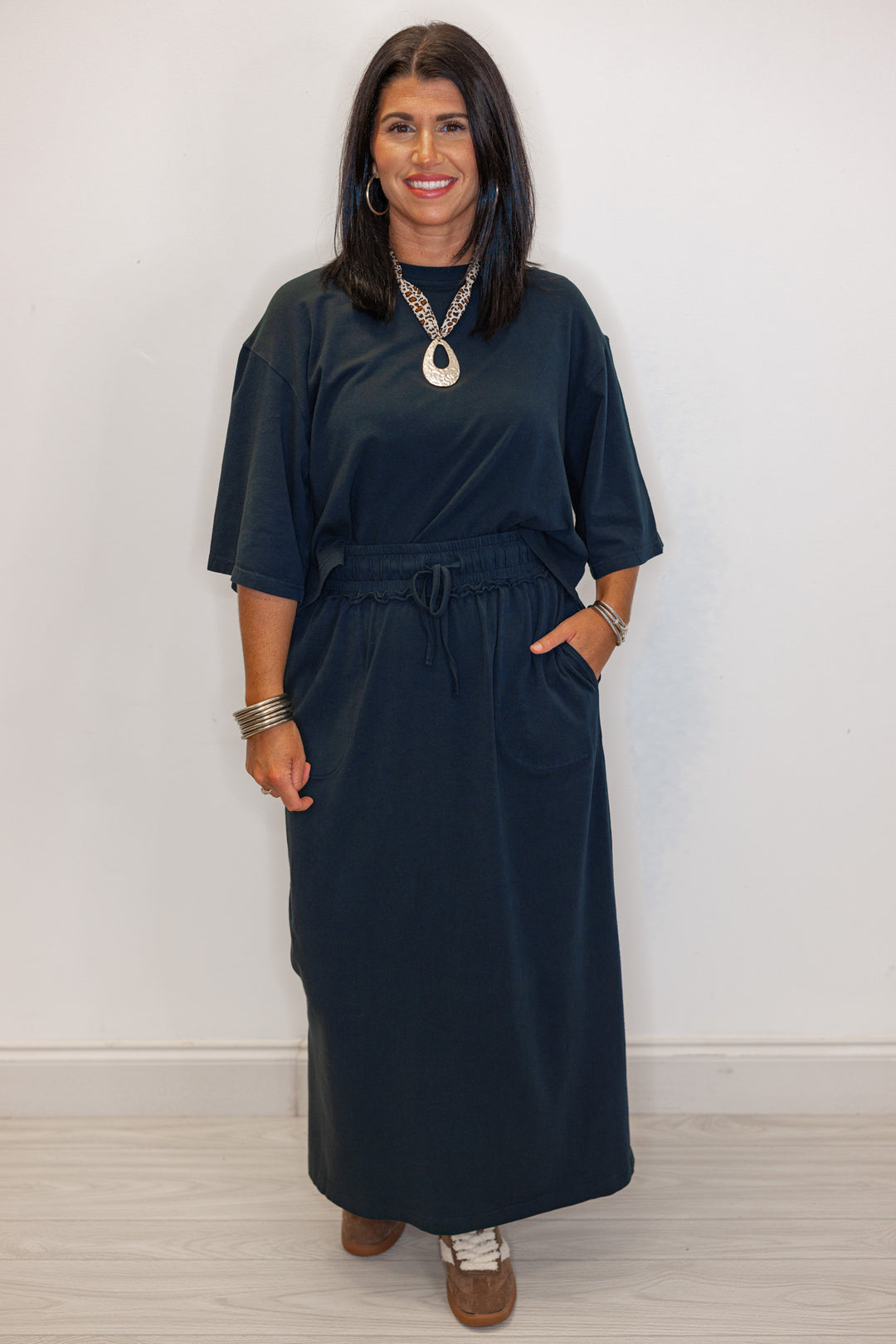 Women's navy maxi skirt and short sleeve top with and leopard print scarf necklace