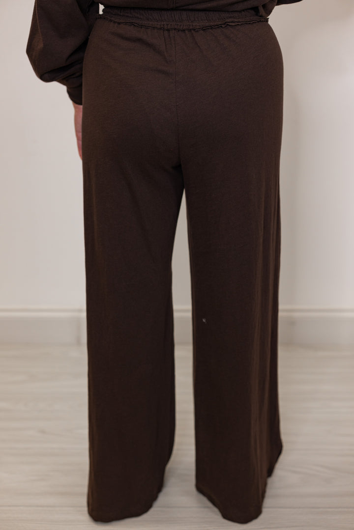 Back view of women's Brown wide-leg pants 