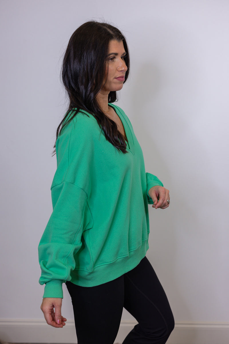 green vneck pullover knit top