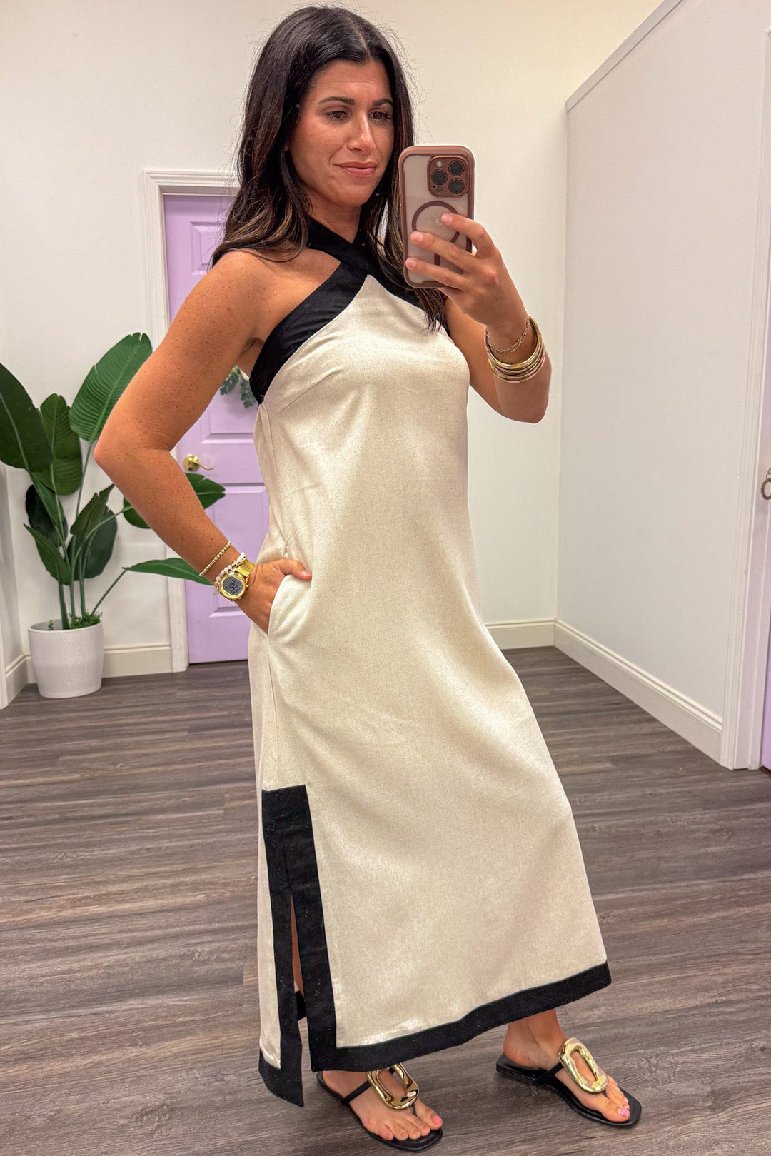 cream with black trim sleeveless halter midi dress with side pockets