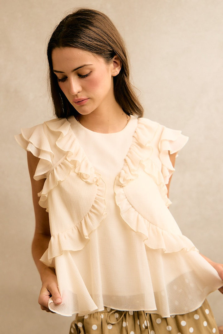 Cream chiffon top with ruffle details by So Me